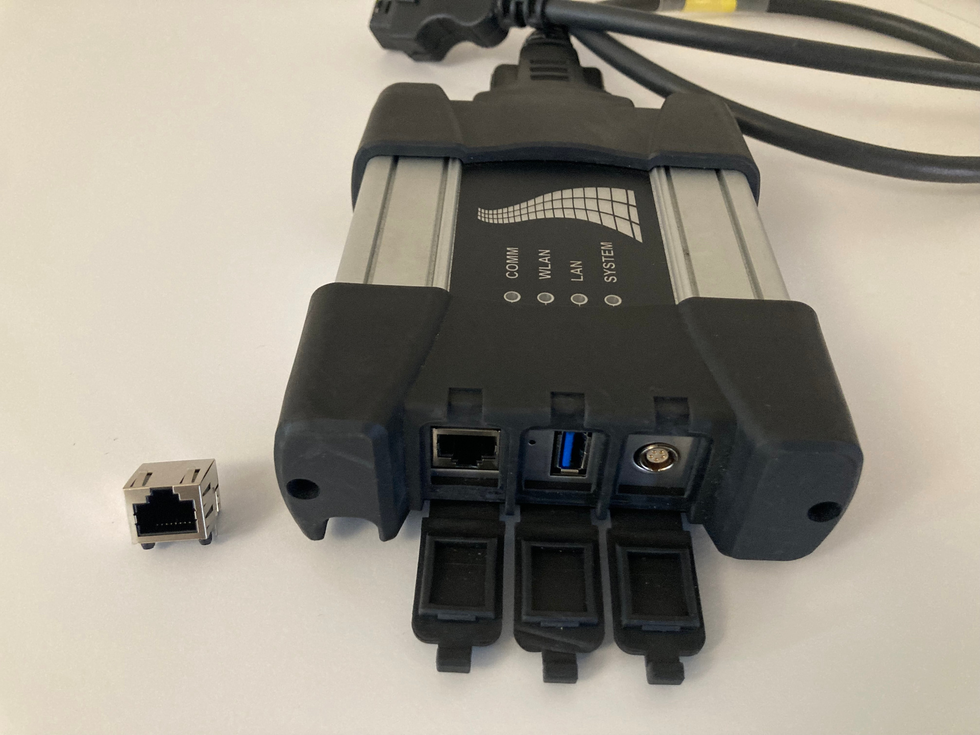 ICOM Next unit showing the RJ45 Ethernet port and replacement connector component